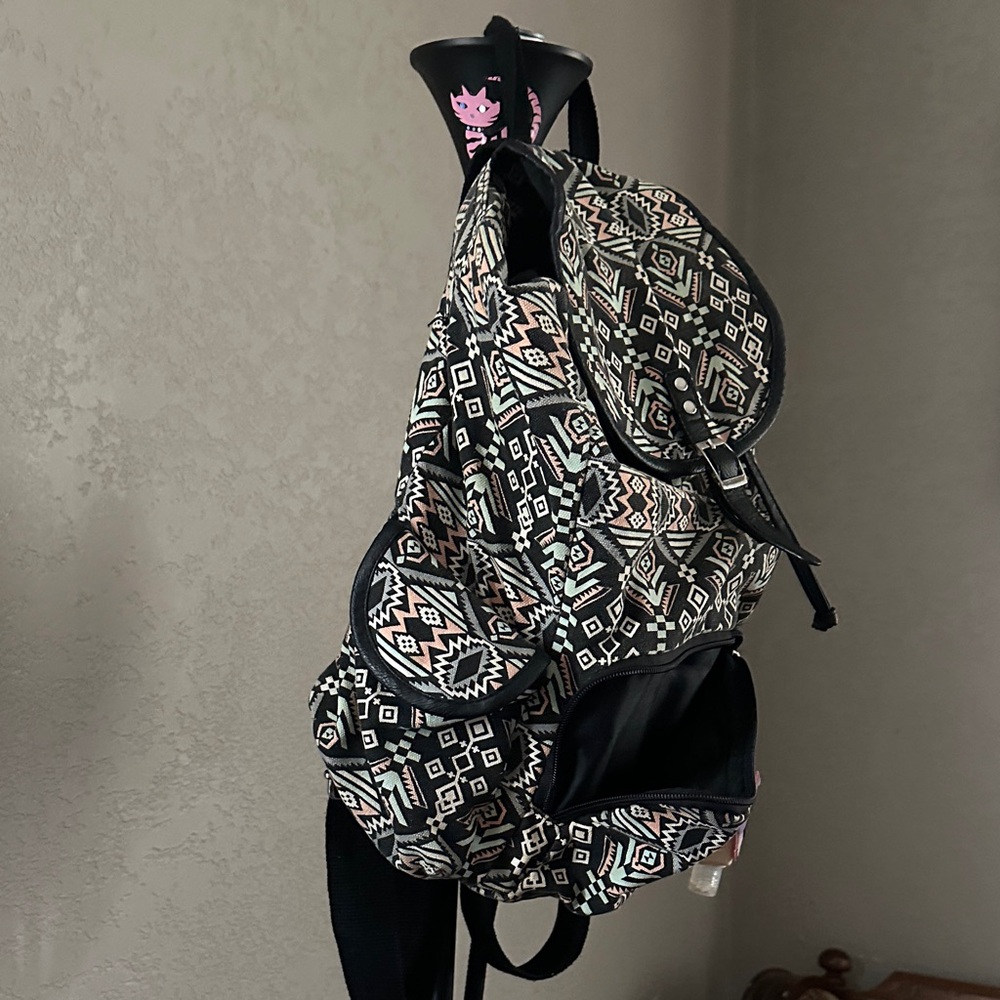 Patterned Backpack With Black And White Accents - image 2